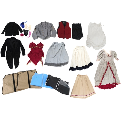 1033 - A collection of theatre costumes including a boned petticoat skirt, a tail coat, ladies dresses and ... 