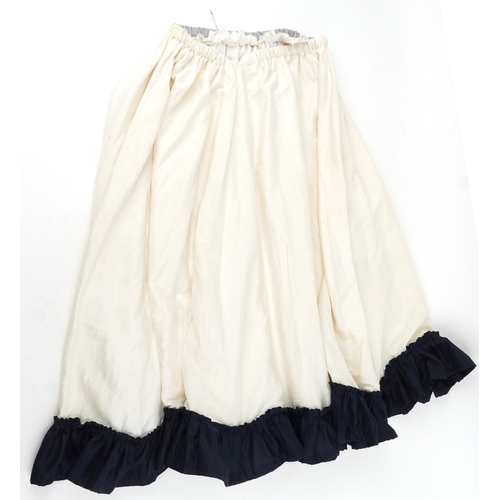 1033 - A collection of theatre costumes including a boned petticoat skirt, a tail coat, ladies dresses and ... 