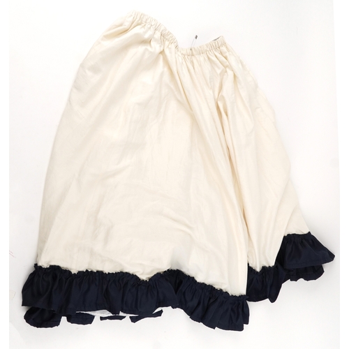 1033 - A collection of theatre costumes including a boned petticoat skirt, a tail coat, ladies dresses and ... 