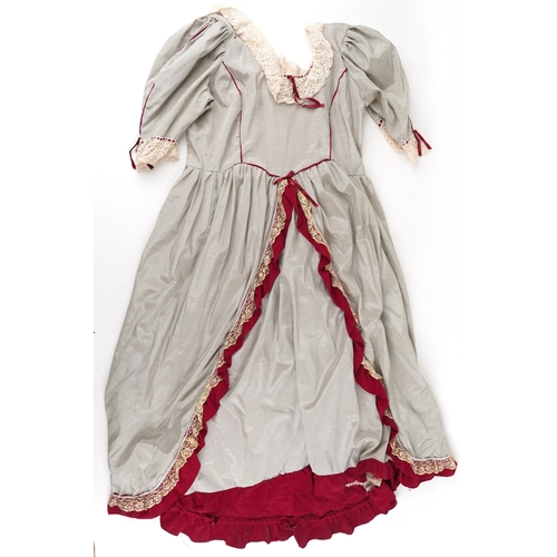 1033 - A collection of theatre costumes including a boned petticoat skirt, a tail coat, ladies dresses and ... 