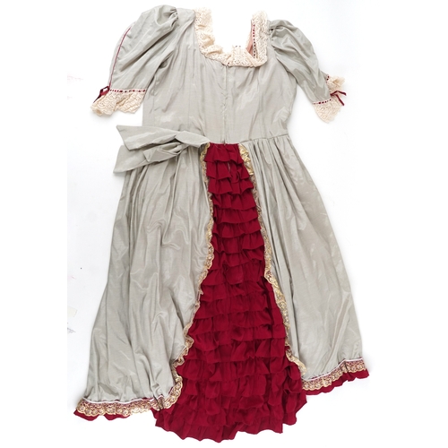 1033 - A collection of theatre costumes including a boned petticoat skirt, a tail coat, ladies dresses and ... 