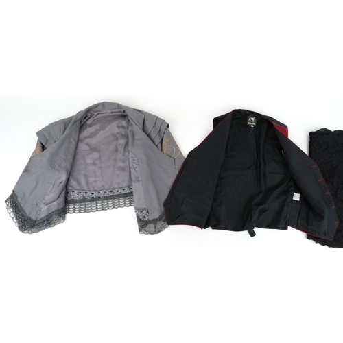 1033 - A collection of theatre costumes including a boned petticoat skirt, a tail coat, ladies dresses and ... 