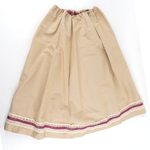 1033 - A collection of theatre costumes including a boned petticoat skirt, a tail coat, ladies dresses and ... 