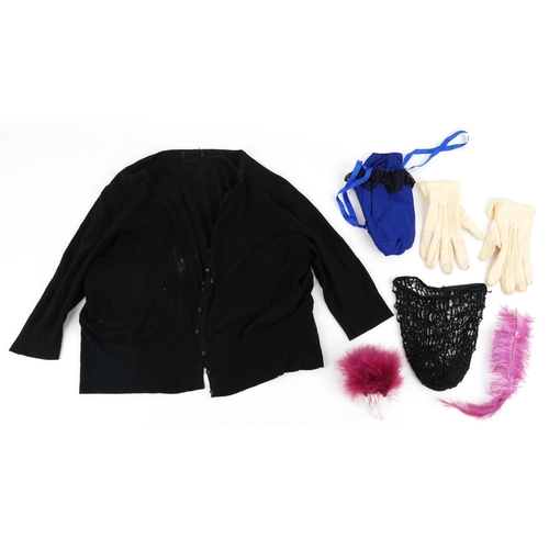 1033 - A collection of theatre costumes including a boned petticoat skirt, a tail coat, ladies dresses and ... 