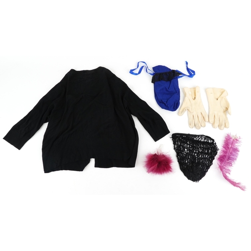 1033 - A collection of theatre costumes including a boned petticoat skirt, a tail coat, ladies dresses and ... 