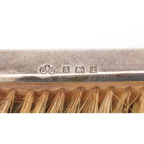 47 - Elkington & Co., an Edwardian silver mounted clothes brush embossed with Putti, Birmingham 1908, 18c... 