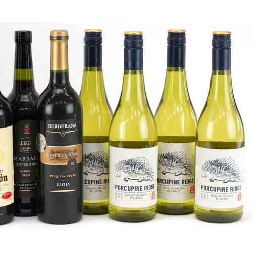 15 - Twelve bottles of table wine including Porcupine Ridge Sauvignon Blanc, Gran Reserva Fondillon, Baro... 