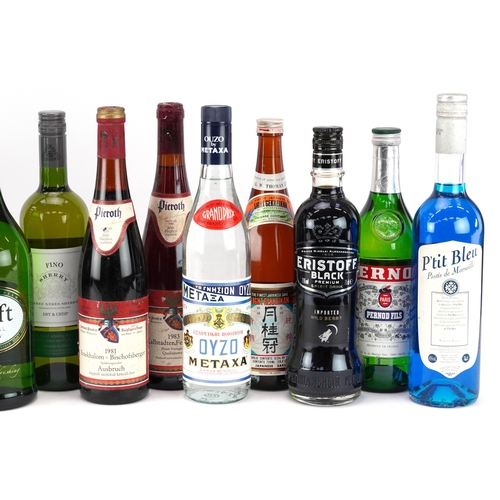19 - Fifteen bottles of alcohol including Oyzo, Pernod, 1983 Kallstadter Feuerberg and Château Lissac 198... 