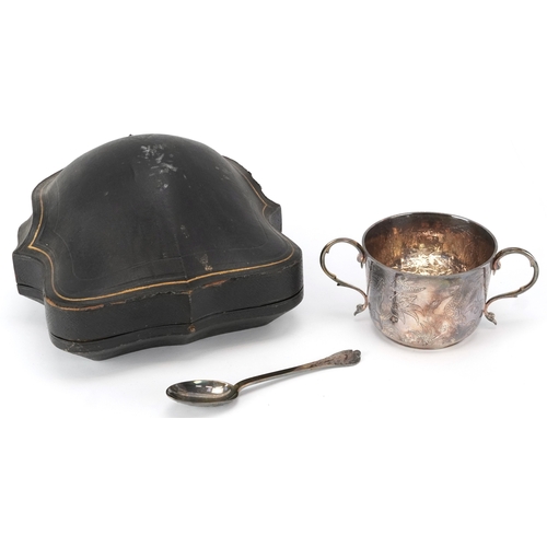 57 - The Goldsmiths & Silversmiths Company, a George V silver twin handled christening cup and spoon engr... 