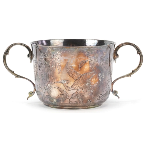 57 - The Goldsmiths & Silversmiths Company, a George V silver twin handled christening cup and spoon engr... 