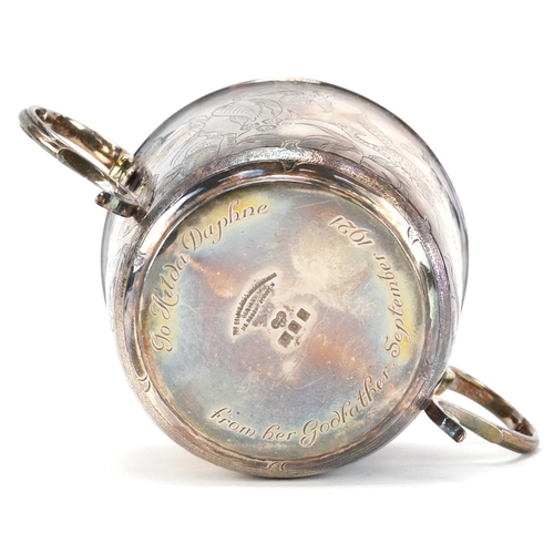 57 - The Goldsmiths & Silversmiths Company, a George V silver twin handled christening cup and spoon engr... 