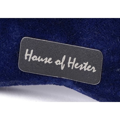 39 - Henry Matthews, a very large silver easel photo frame profusely embossed with flowers, foliage and a... 