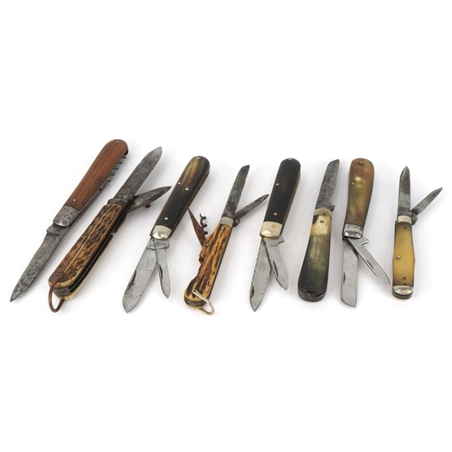 539 - A collection of folding pocket knives and tools with bone and wood flanked handles, the largest 12cm... 