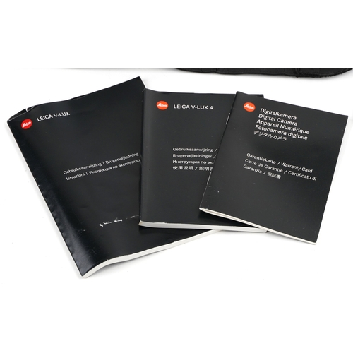  A Leica V Lux 4 camera with box and accessories.