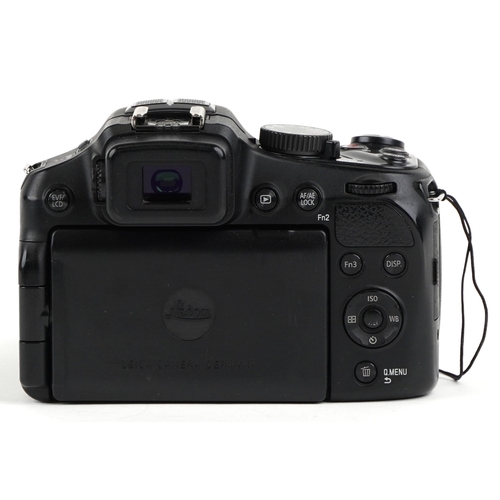  A Leica V Lux 4 camera with box and accessories.