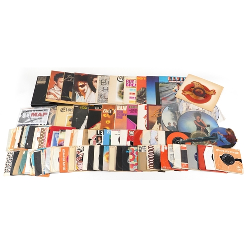 2609 - A collection of vinyl LP records and 45rpm records including Elvis Presley, Buddy Holly & The Cricke... 
