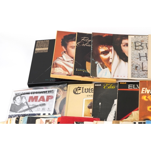 2609 - A collection of vinyl LP records and 45rpm records including Elvis Presley, Buddy Holly & The Cricke... 