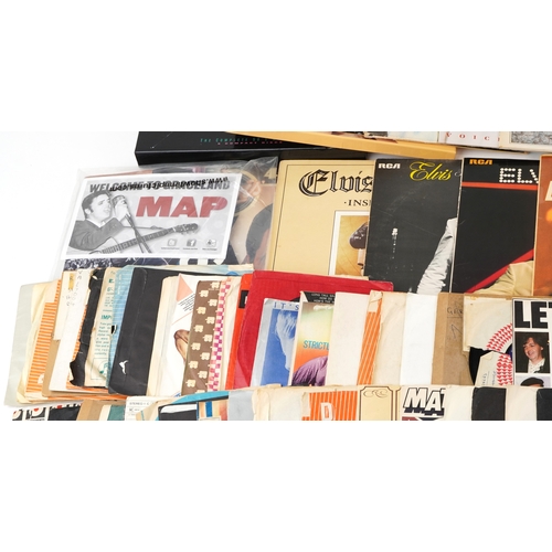 2609 - A collection of vinyl LP records and 45rpm records including Elvis Presley, Buddy Holly & The Cricke... 