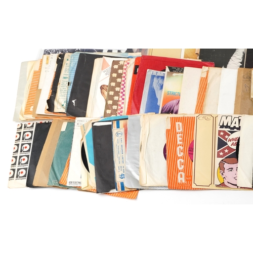 2609 - A collection of vinyl LP records and 45rpm records including Elvis Presley, Buddy Holly & The Cricke... 