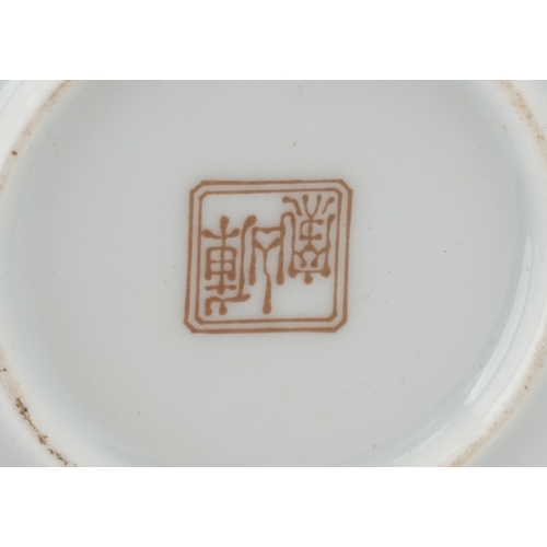 1580 - A Chinese porcelain six place tea service with teapot decorated with storks and foliage, the teapot ... 