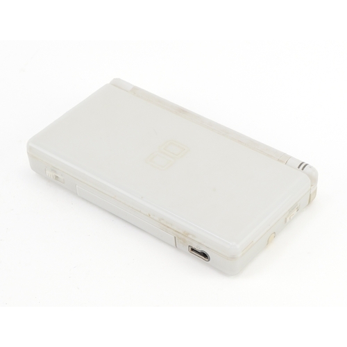 729 - A Nintendo DS Lite model number USG-001.