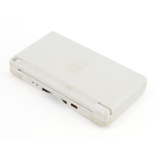 729 - A Nintendo DS Lite model number USG-001.