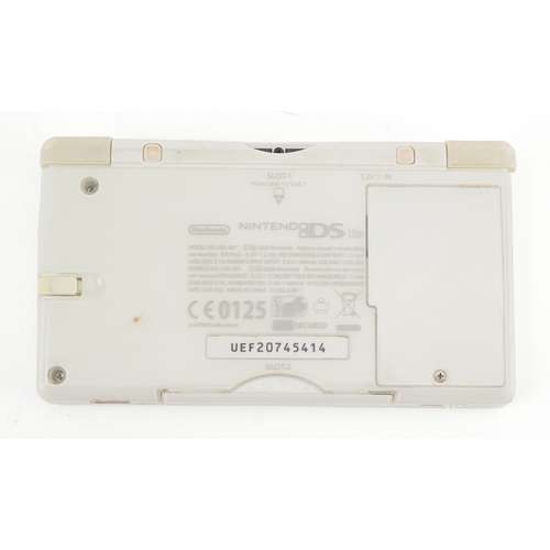 729 - A Nintendo DS Lite model number USG-001.