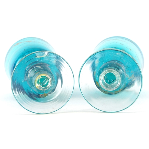 169 - Two blue swirling glass goblets, one etched Mdina to the base, the largest 17cm high.