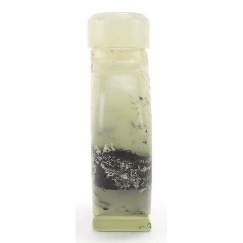 1835 - A Chinese green hardstone snuff bottle with engraved decoration, 6cm high.