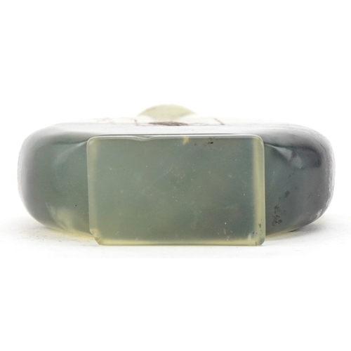 1835 - A Chinese green hardstone snuff bottle with engraved decoration, 6cm high.