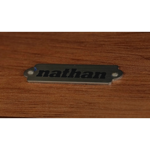 2047 - A late 20th century Nathan Furniture teak extending dining table and four matching chairs, the table... 