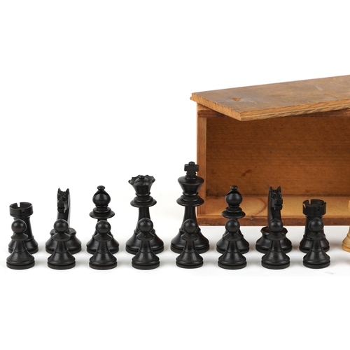 741 - A 20th century turned boxwood and ebony chess set, the king 6cm high.