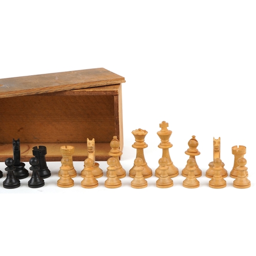 741 - A 20th century turned boxwood and ebony chess set, the king 6cm high.