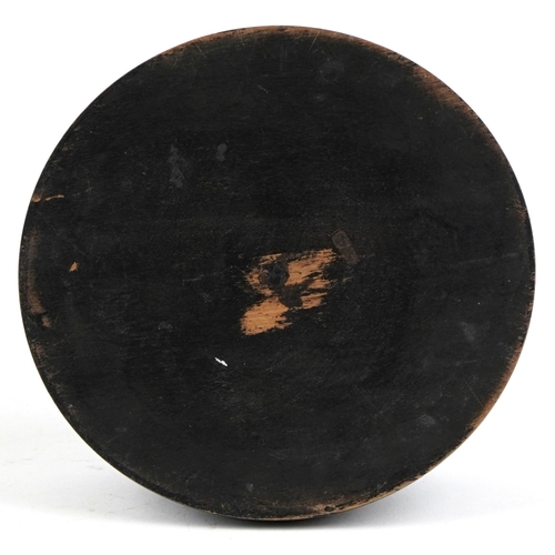 348 - A Victorian glass dome on an ebonised base, 35cm high.