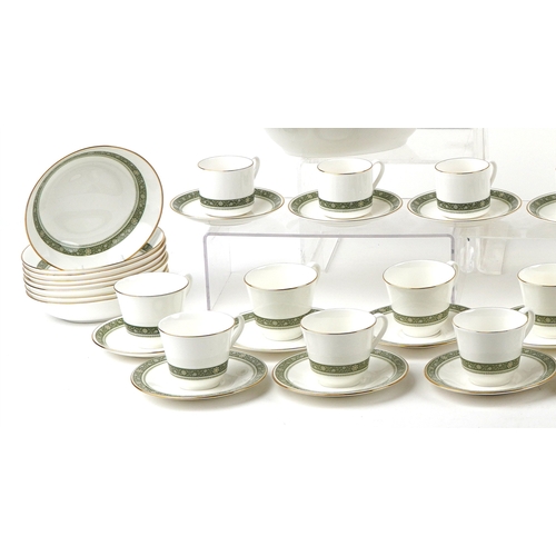 674 - A Royal Doulton part dinner and tea service in the Rondelay pattern including seven coffee cups, ele... 