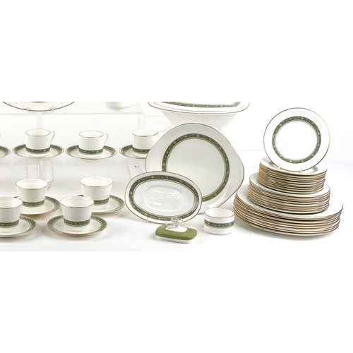 674 - A Royal Doulton part dinner and tea service in the Rondelay pattern including seven coffee cups, ele... 