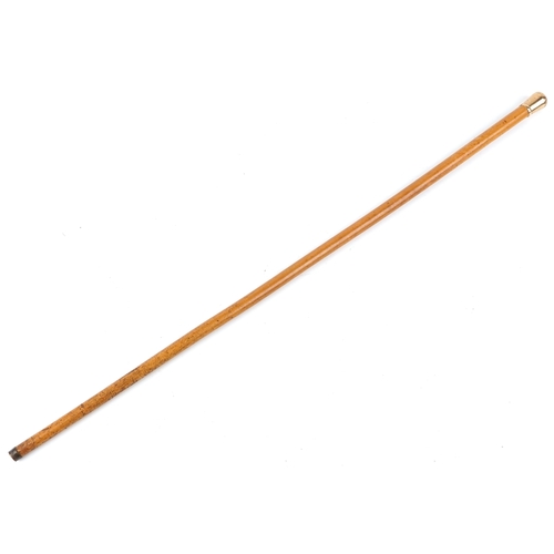  A George V malacca walking cane with 9ct gold handle, London 1929, 90cm in length.