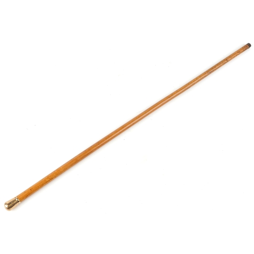  A George V malacca walking cane with 9ct gold handle, London 1929, 90cm in length.