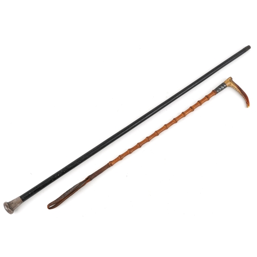 420 - An ebonised walking stick with silver collar and bamboo riding crop with horn handle and silver coll... 
