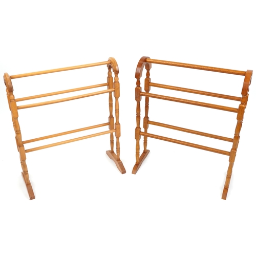 2149 - Two similar late 20th century turned towel rails, the largest 80cm high x 66cm wide.