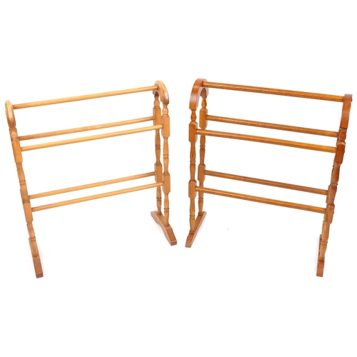 2149 - Two similar late 20th century turned towel rails, the largest 80cm high x 66cm wide.