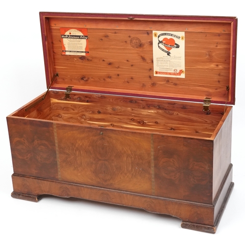 2123 - An early 20th century American walnut blanket box with inlaid decoration, on block feet, 56cm H x 11... 