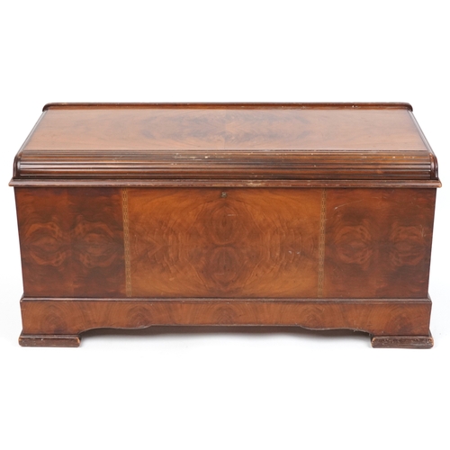 2123 - An early 20th century American walnut blanket box with inlaid decoration, on block feet, 56cm H x 11... 