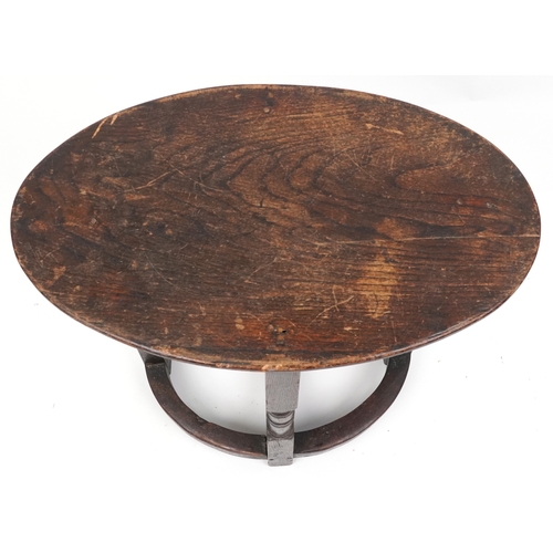 2150 - A late Victorian oak oval occasional table raised on turned and block supports, 59cm H x 72cm W x 46... 