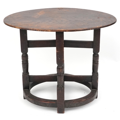 2150 - A late Victorian oak oval occasional table raised on turned and block supports, 59cm H x 72cm W x 46... 