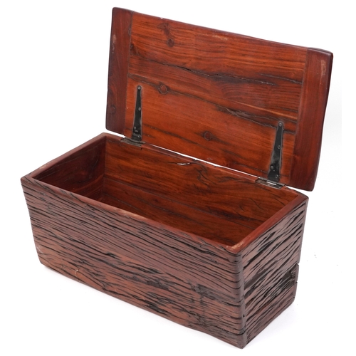 2198 - A late 20th century Eastern hardwood box with hinged lid, 32cm H x 65cm W x 35cm D.