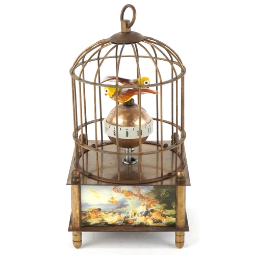 1674 - A clockwork automaton bird cage alarm clock, 16cm high.