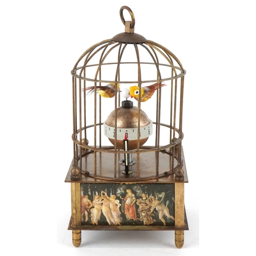1674 - A clockwork automaton bird cage alarm clock, 16cm high.