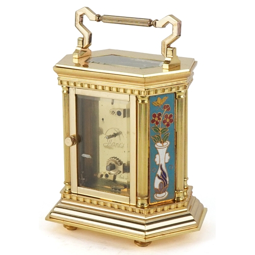127 - A French brass cased and champlevé enamel carriage clock, the white enamelled dial with black Roman ... 