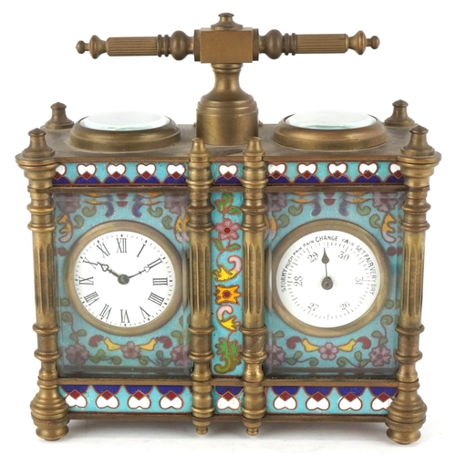 134 - A champlevé enamel brass cased travelling timepiece with clock and barometer, 14cm high.